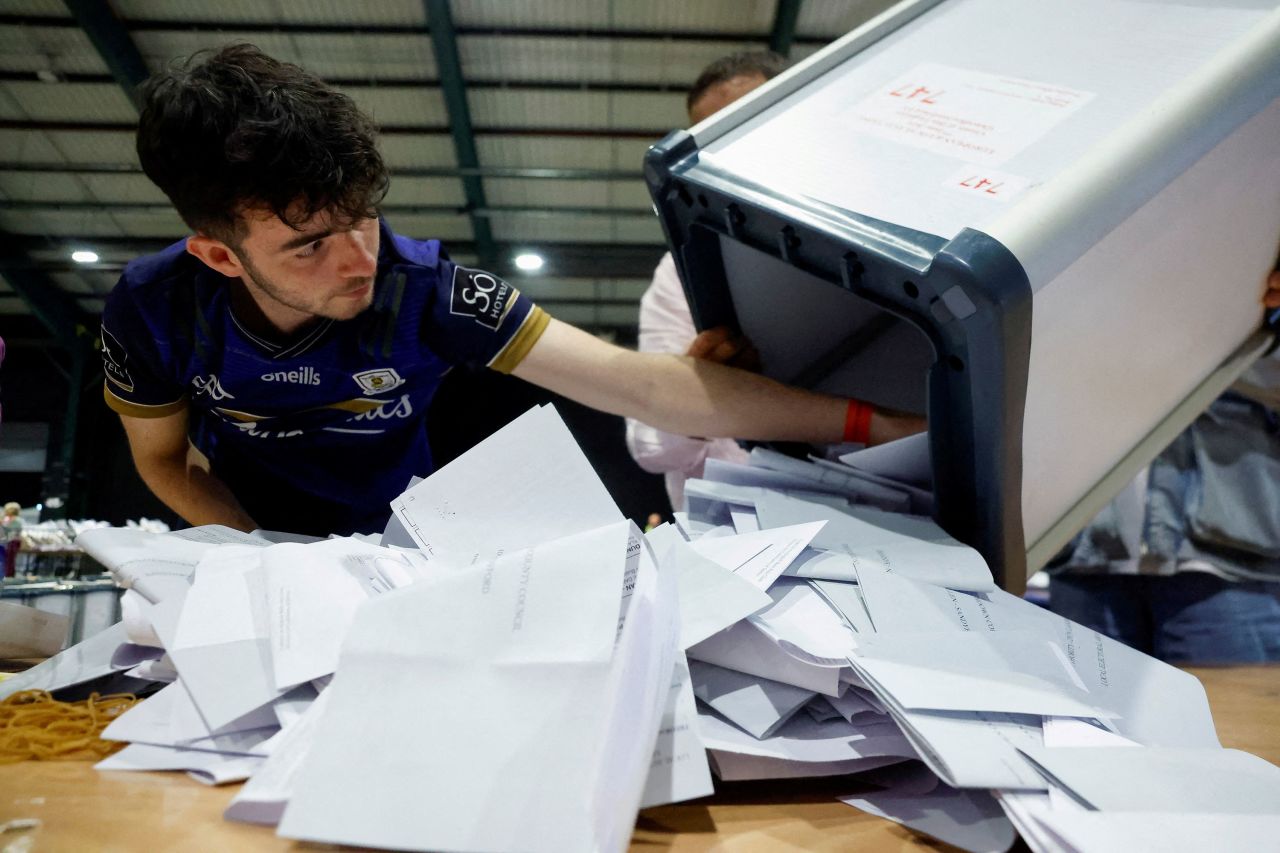 Ballot boxes are opened at a counting center in Dublin on June 8. 