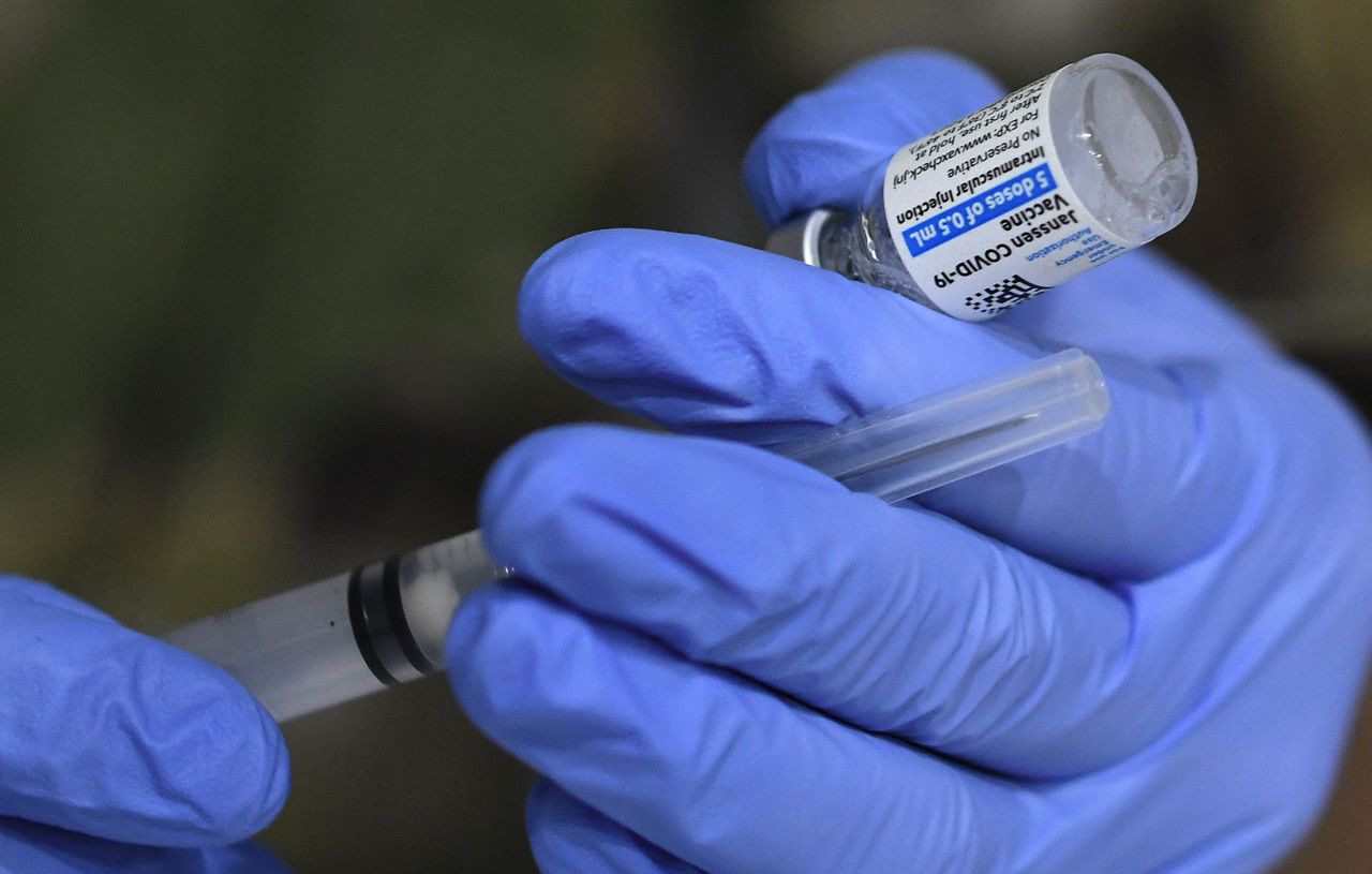 An Army nurse prepares a dose of the Johnson & Johnson Covid-19 vaccine in Orlando, Florida, on April 25. 