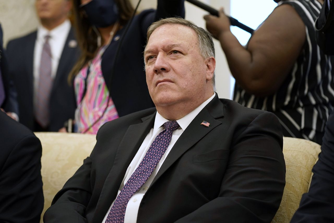 Secretary of State Mike Pompeo listens to a reporter's question during a meeting with President Donald Trump and Iraqi Prime Minister Mustafa al-Kadhimi in the Oval Office of the White House on Thursday, August 20.