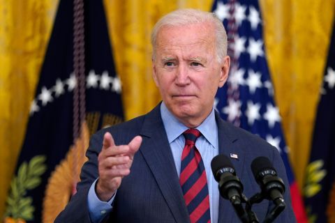 President Joe Biden gestures to a reporter to ask him a question as he speaks about the coronavirus pandemic in the East Room of the White House on, Tuesday, August 3.