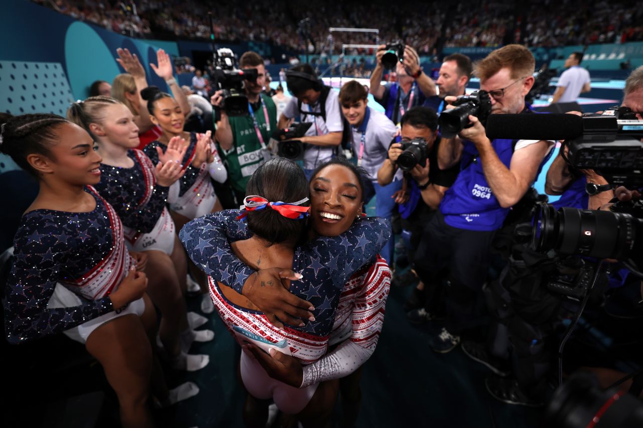 Hezly Rivera, Jade Carey, Sunisa Lee, Jordan Chiles and Simone Biles of Team USA celebrate after winning gold at Bercy Arena in Paris, on July 30.