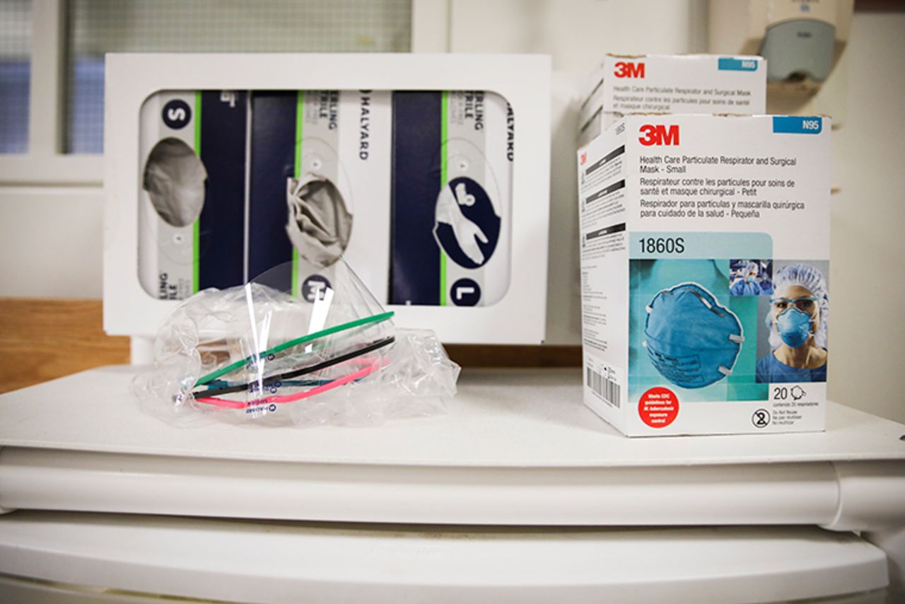 N95 masks rest on a cart of filled with other protective gear that must be worn when dealing with patients with an infectious disease as Massachusetts General Hospital in Boston prepares for a possible surge in coronavirus patients on Thursday, February 27.