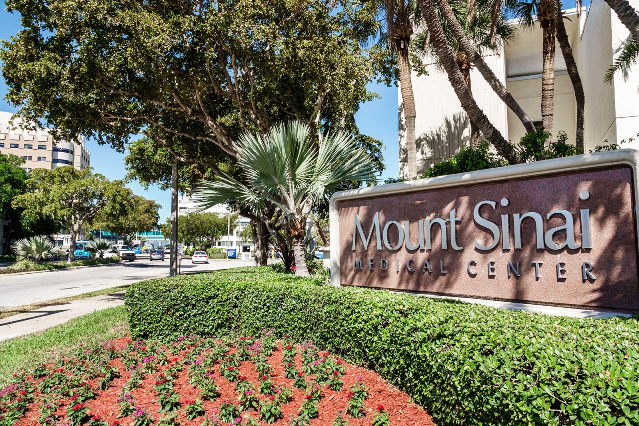 A sign for Mount Sinai Medical Center is seen in Miami Beach, Florida.