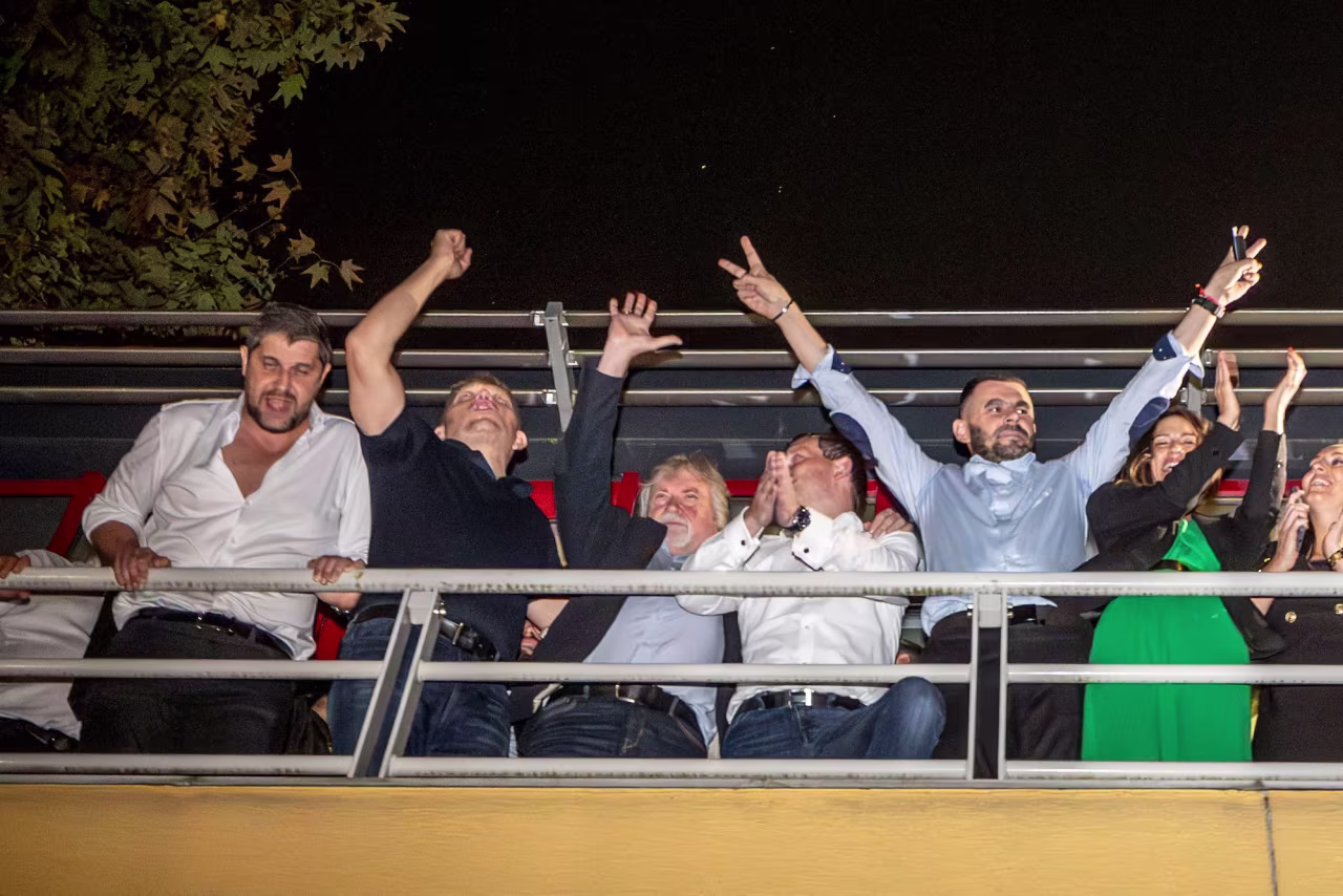 Robert Fico, second from left, celebrates his victory in the general elections alongside party members in Bratislava on Sunday.