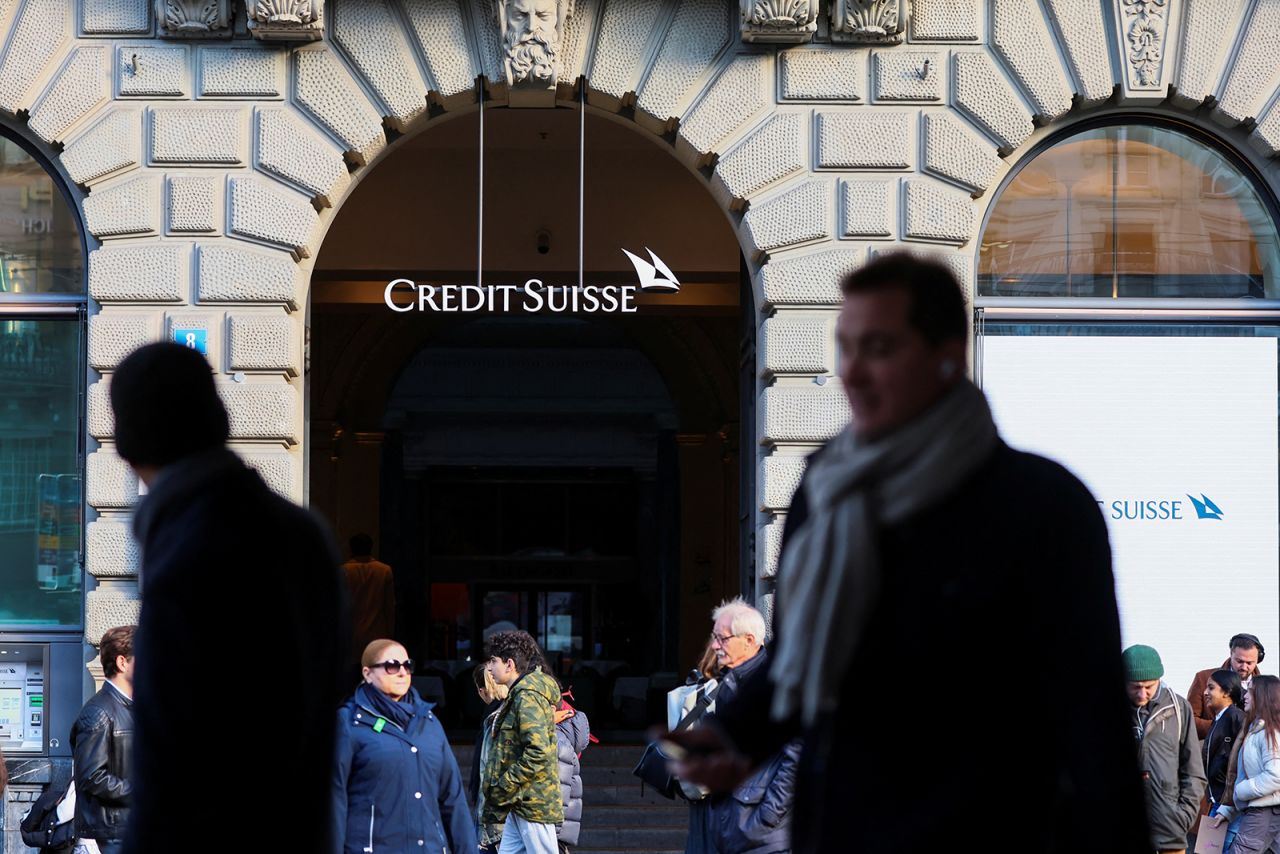 People walk near Swiss bank?Credit?Suisse?in Zurich, Switzerland, on March 20.