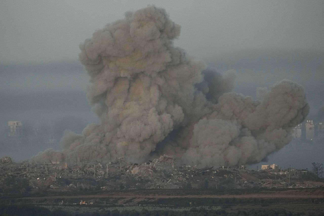 Smoke seen from Israel, rises following an Israeli airstrike in the Gaza, on Friday, November 24.