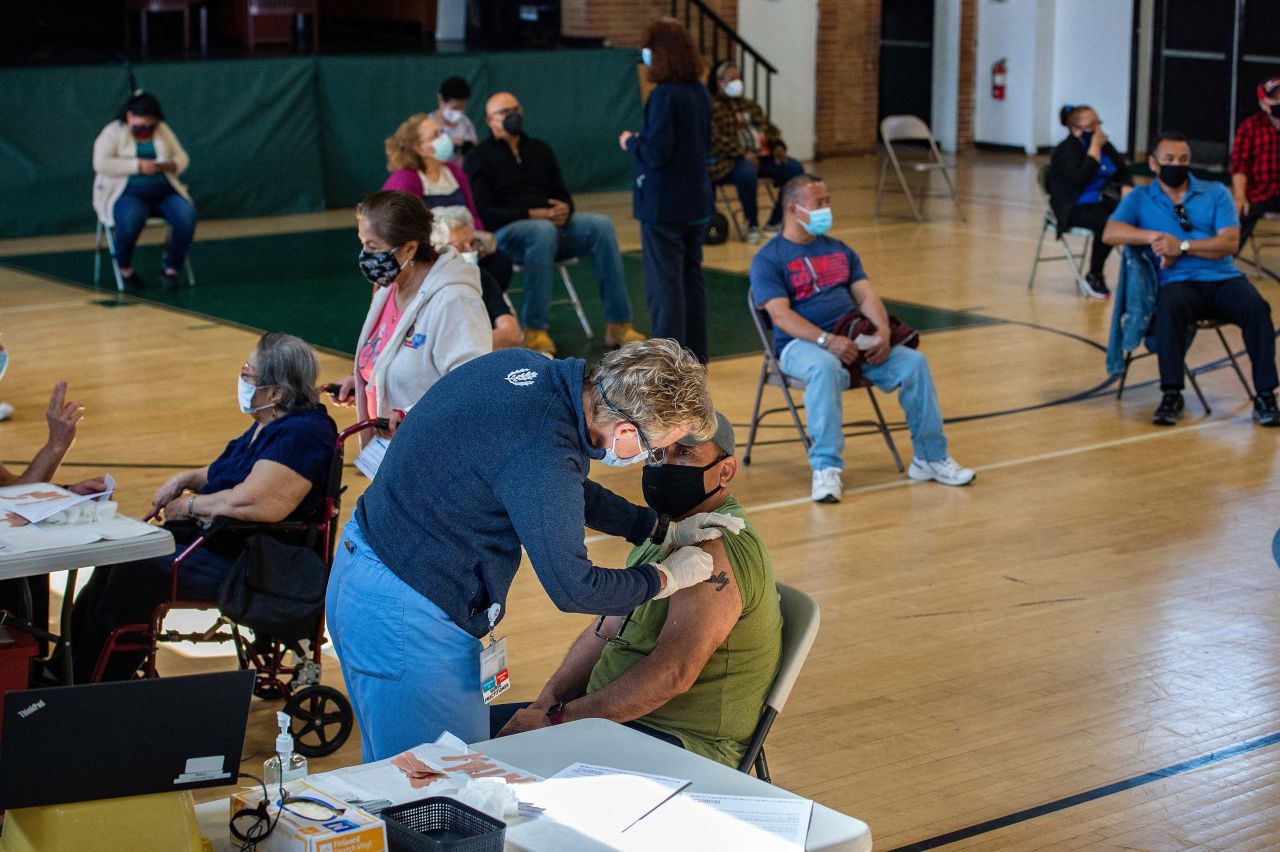 People receive the Moderna Covid-19 vaccine at a mobile vaccination clinic in Bridgeport, Connecticut on April 20. 