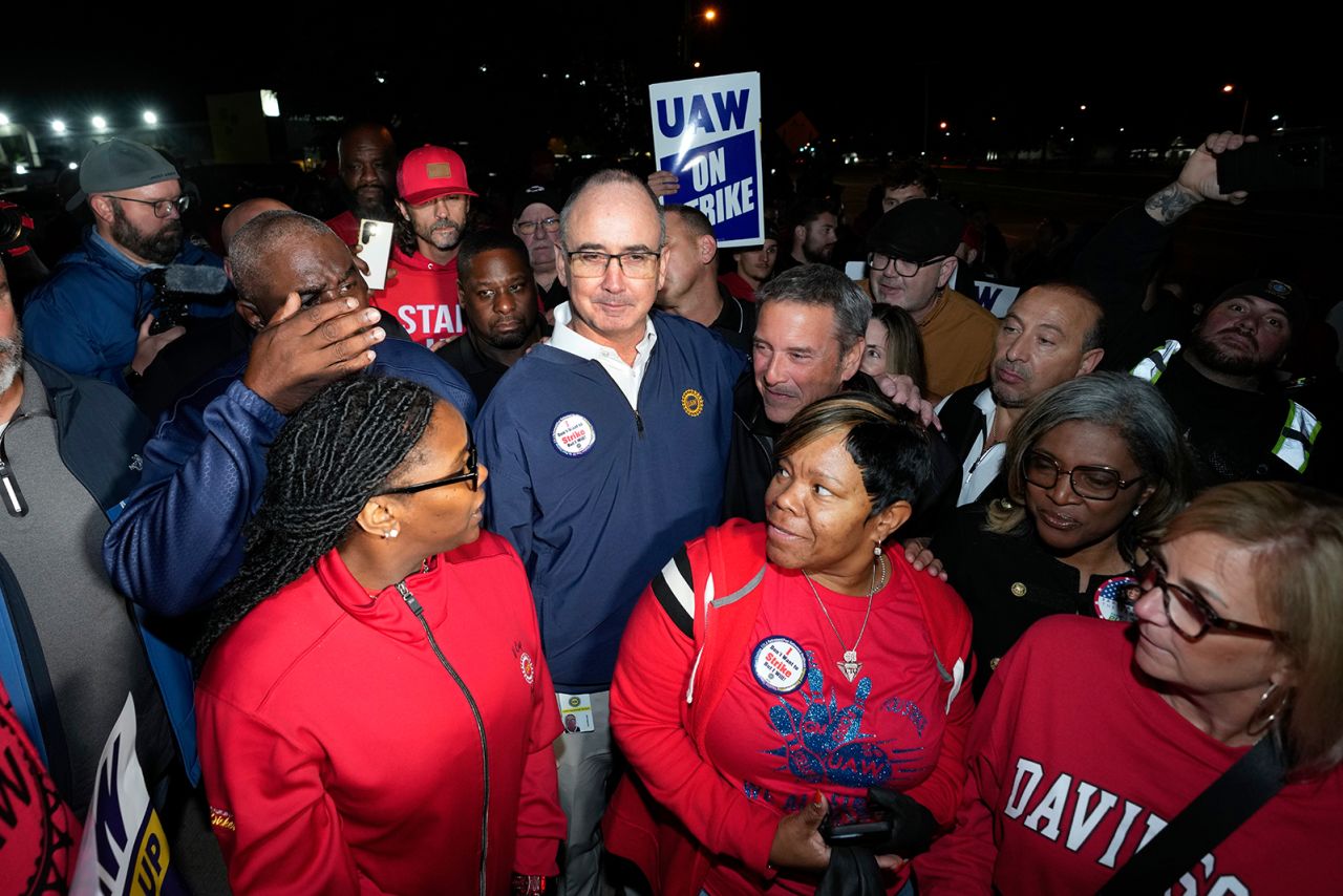 Shawn Fain stands with UAW members striking at Ford's Michigan Assembly Plant in Wayne on September 15.