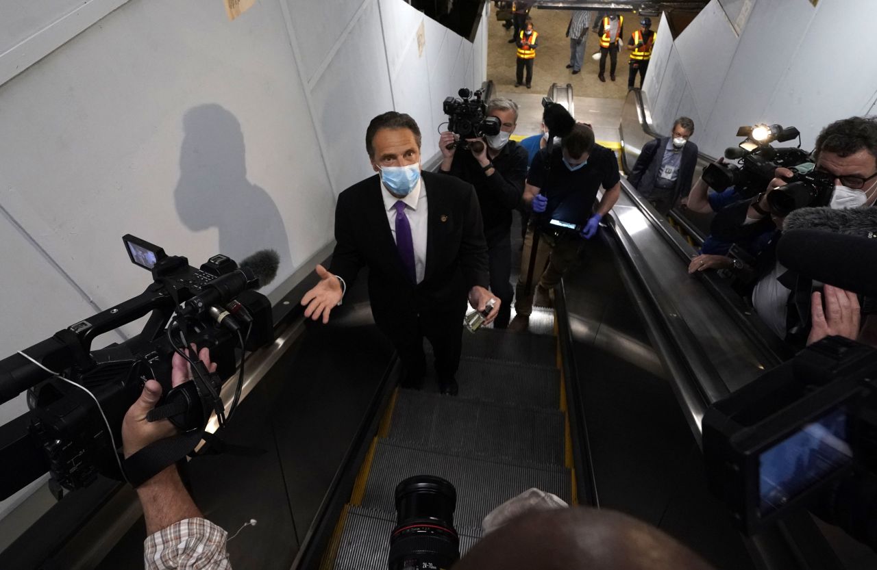 New York Governor Andrew Cuomo speaks after riding the New York City subway 7 train into the city on June 8 in New York.