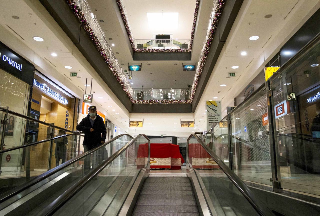 A person is seen inside a mall, partially closed due to COVID-19 restrictions, in Sofia, Bulgaria, on December 9.