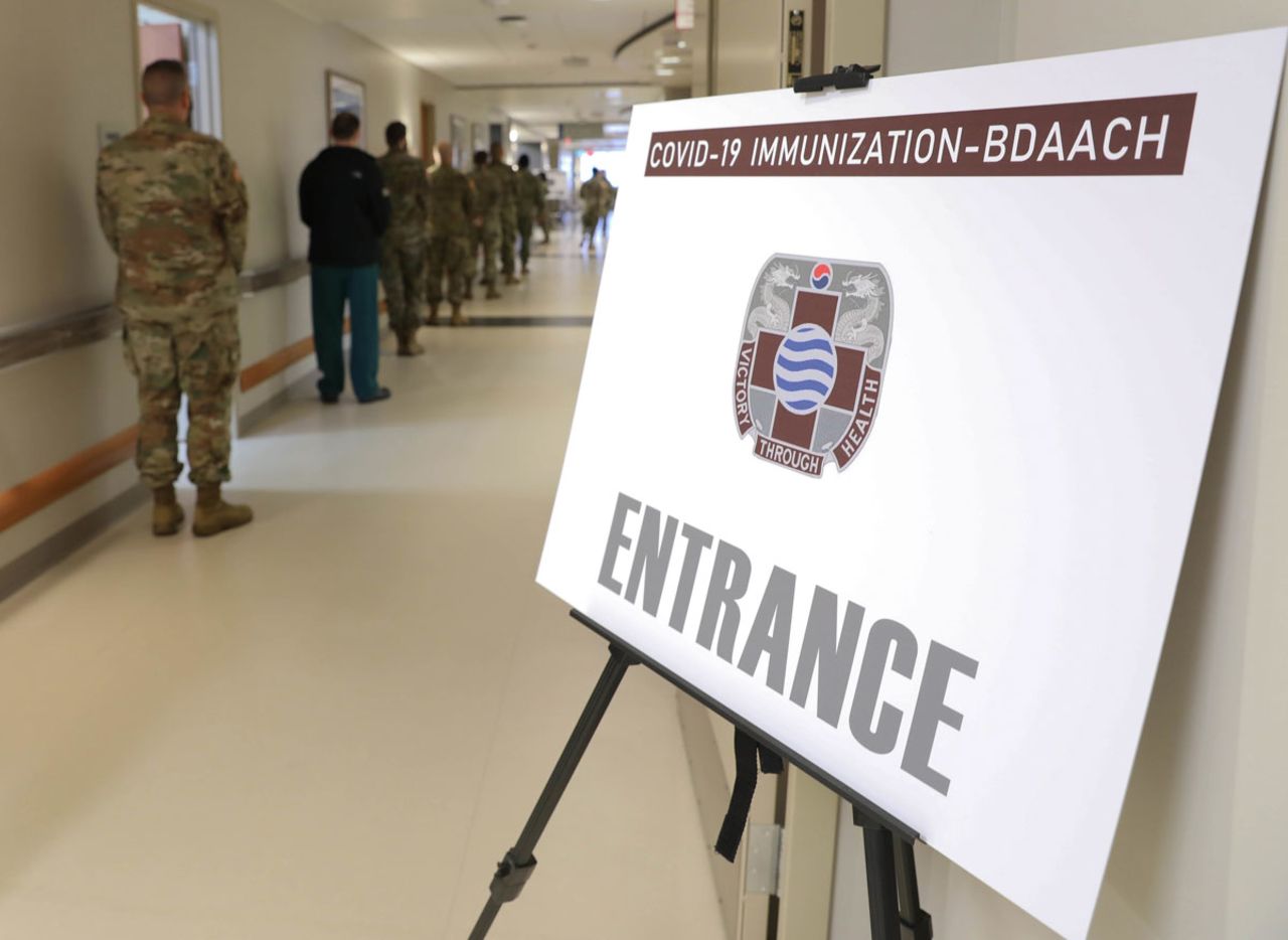 US soldiers stand in line to receive the first Covid-19 vaccines at Brian D. Allgood Army Community Hospital in Pyeongtaek, South Korea on December 29.