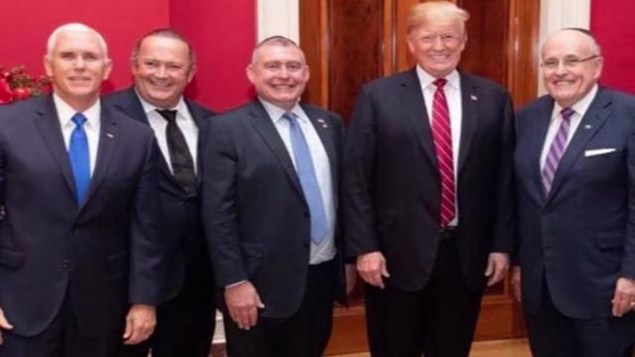 Igor Fruman and Lev Parnas (second and third from left) pictured with Vice President Mike Pence, President Donald Trump and Rudy Giuliani.