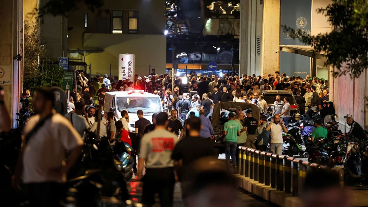 People gather outside American University of Beirut Medical Center in Beirut, Lebanon September 17.