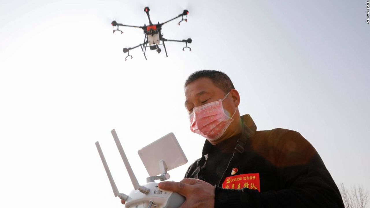 A local resident using a drone spraying disinfectant at a village in China's central Henan province in January.