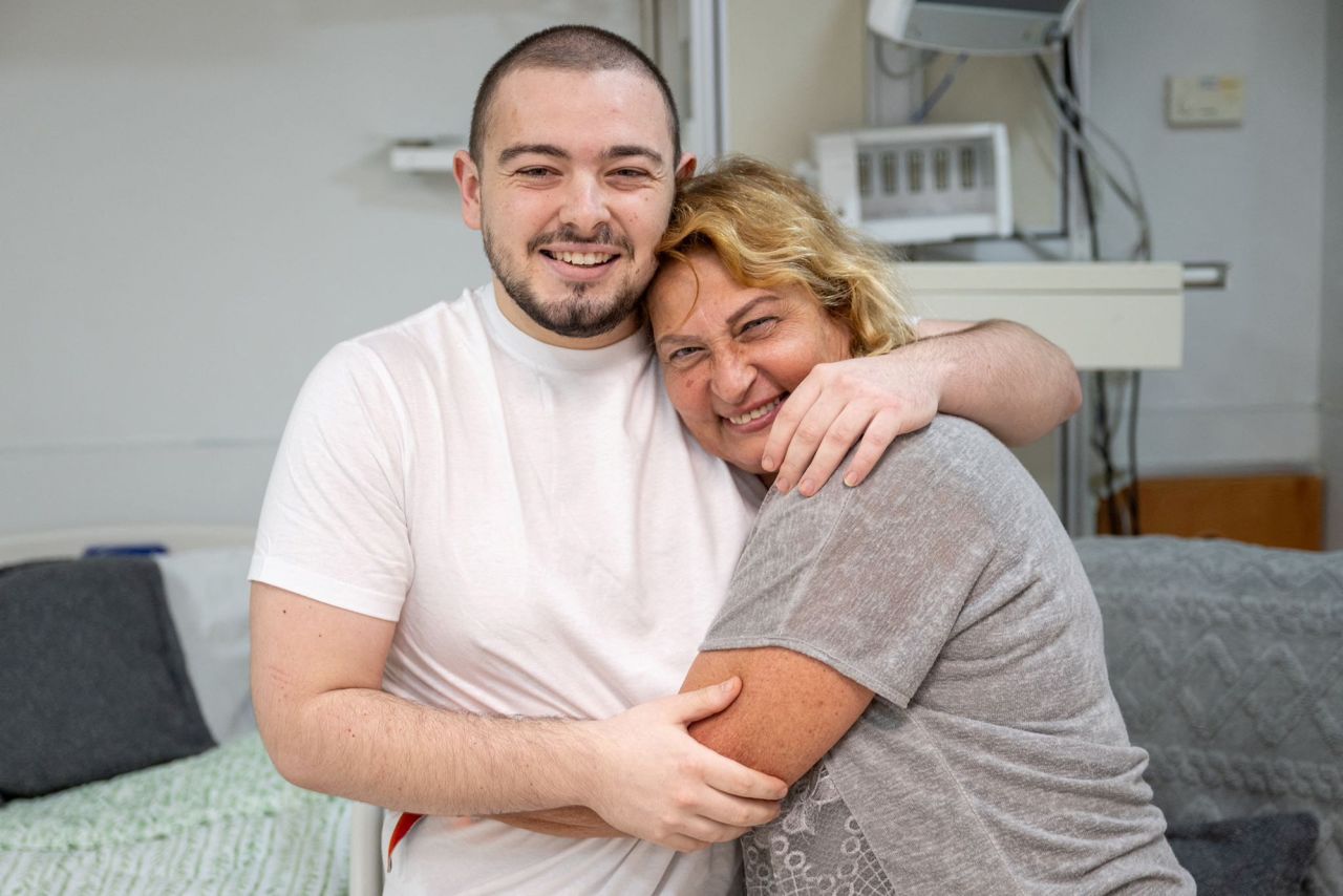 Almog Meir Jan, a rescued hostage embraces his mother, Orit Meir in Ramat Gan, Israel, in this handout image dated June 8.