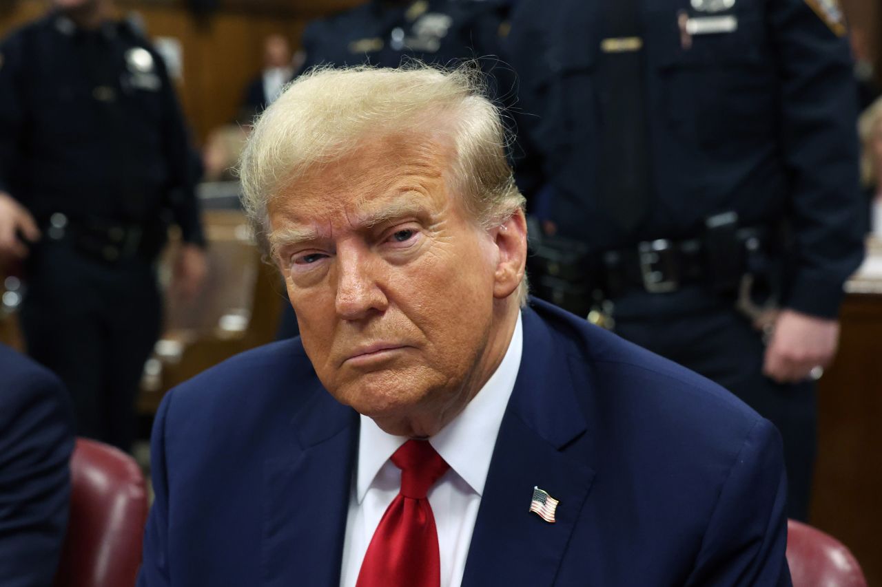 Former President Donald Trump sits in a courtroom at Manhattan Criminal Court in New York on Thursday. 