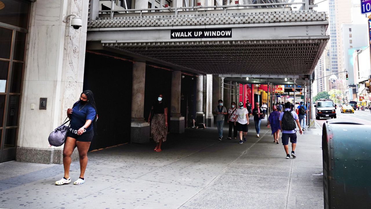 People walk in New York City on August 21. 