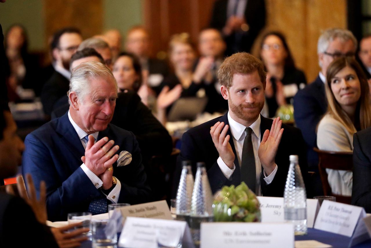 Prince Harry and Prince Charles, Prince of Wales applaud while attending the 'International Year of The Reef' 2018 meeting at Fishmongers Hall on February 14, 2018 in London, England.