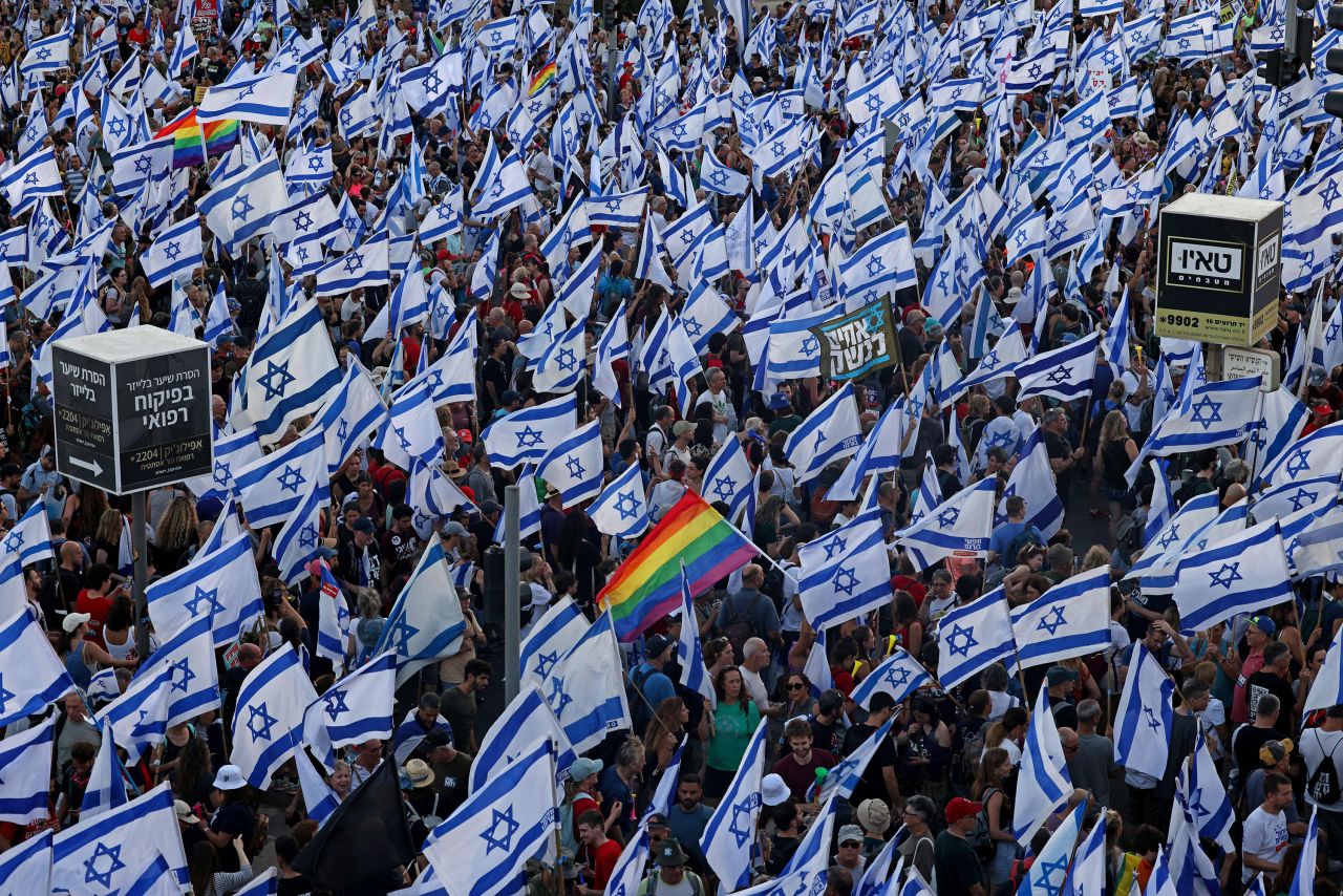 Protesters gather with national and rainbow flags outside the Israeli parliament and the supreme court in Jerusalem, Israel, on July 23.