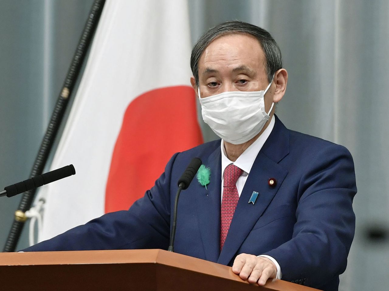 Japanese Chief Cabinet Secretary Yoshihide Suga at a news conference in Tokyo on April 21.