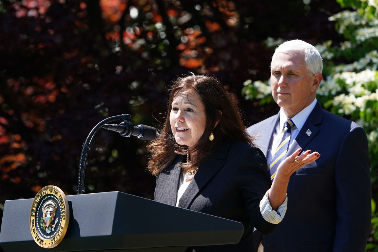 Vice President Mike Pence listens as his wife Karen Pence speaks at a tree planting ceremony to mark Earth Day and Arbor Day on the South Lawn of the White House in Washington on April 22. 