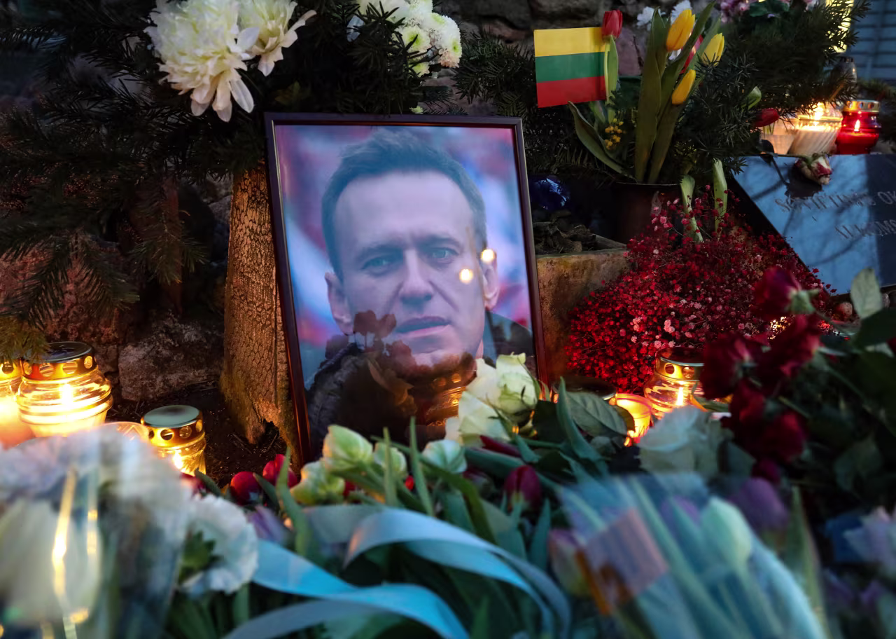 Flowers lie at a makeshift memorial for Alexey Navalny in Vilnius, Lithuania, on February 16.