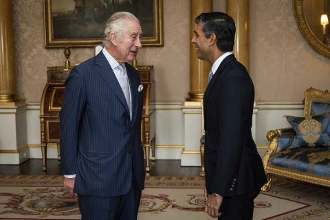 King Charles III speaks with Rishi Sunak at Buckingham Palace, London Tuesday. 