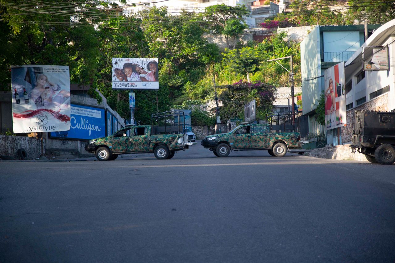 Military vehicles block the entrance to Petion Ville in Port-au-Prince on Wednesday.