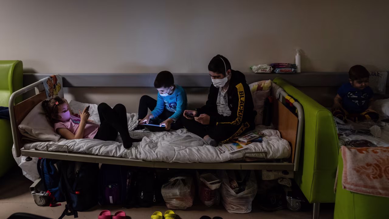 Young cancer patients distract themselves in one of the hospital's bomb shelters.