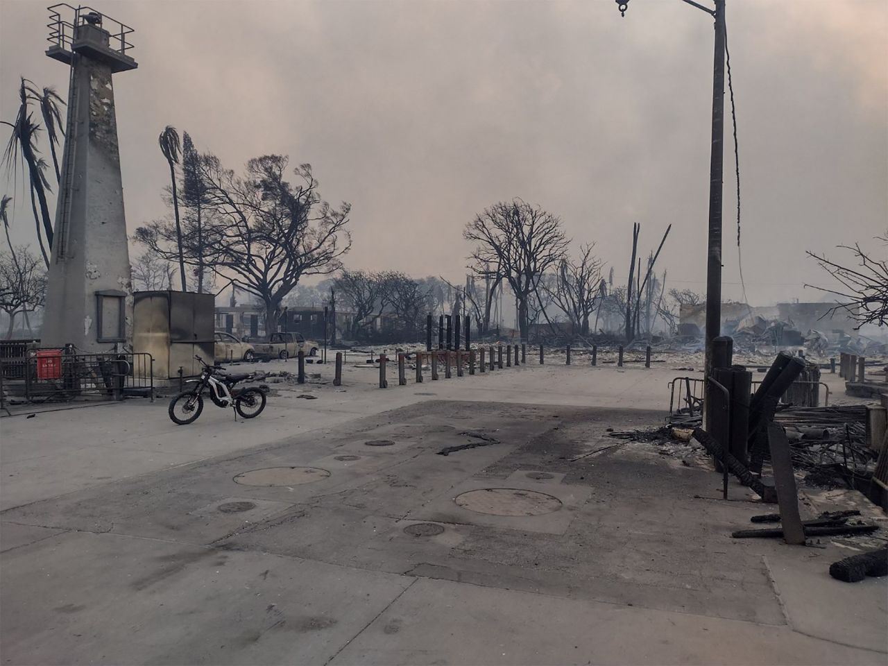 Destroyed buildings smolder after wildfires fanned by the winds of a distant hurricane devastated Maui's city of Lahaina on Wednesday. 