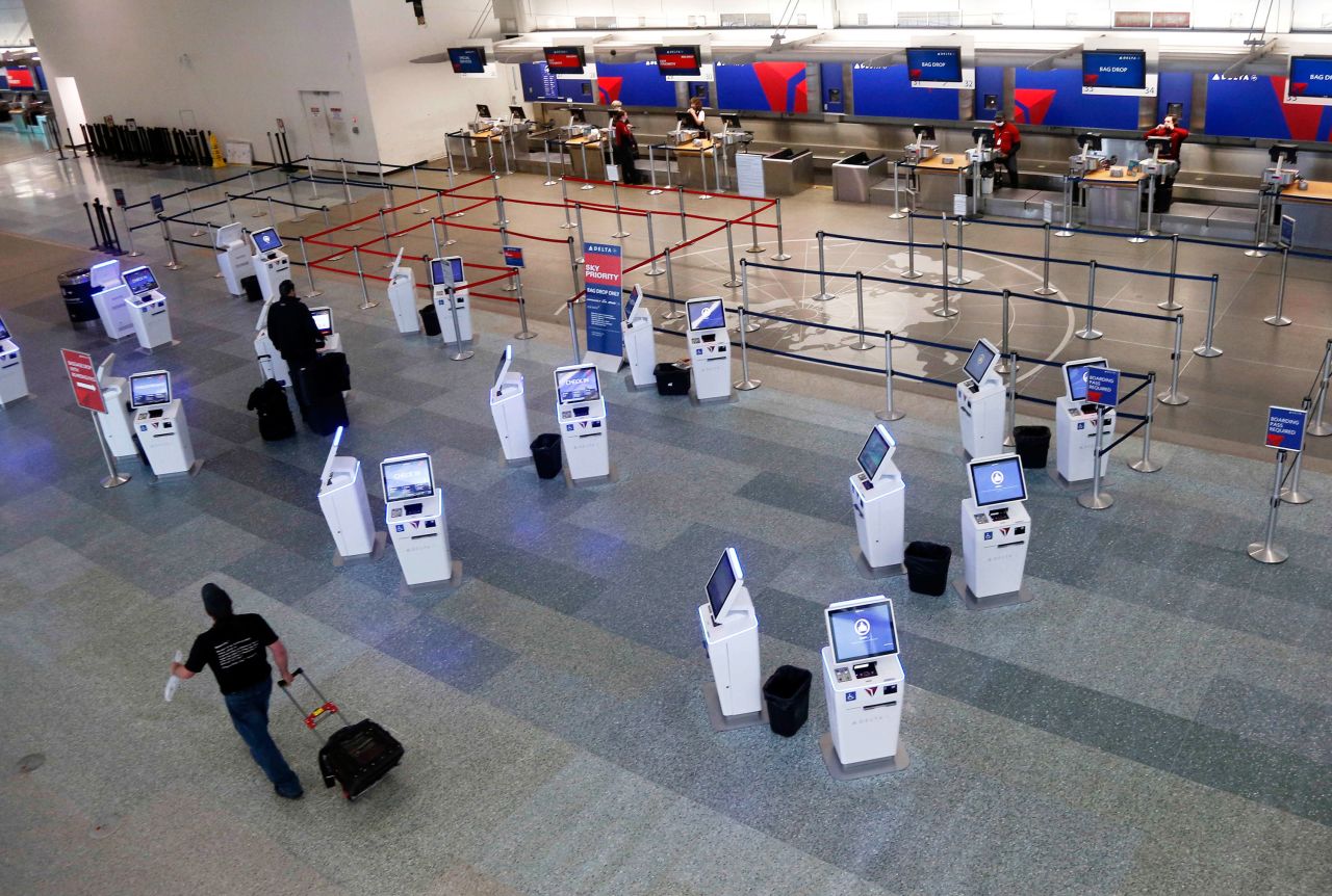 Nearly empty lines are seen at the Delta ticket counters at Minneapolis-St. Paul International Airport on May 4 in Minneapolis, Minnesota.