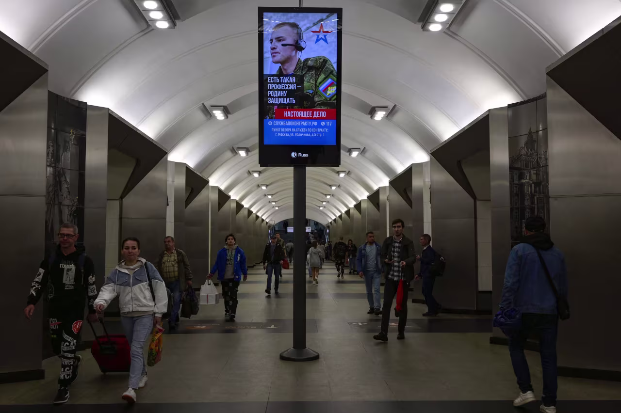 An advertisement promoting contract military service in the Russian army is seen in a Moscow metro station on July 19.