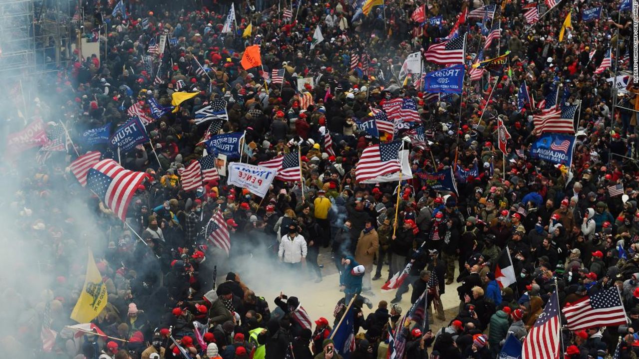 Trump supporters clash with police and security forces as they storm the US Capitol in Washington D.C on January 6, 2021.