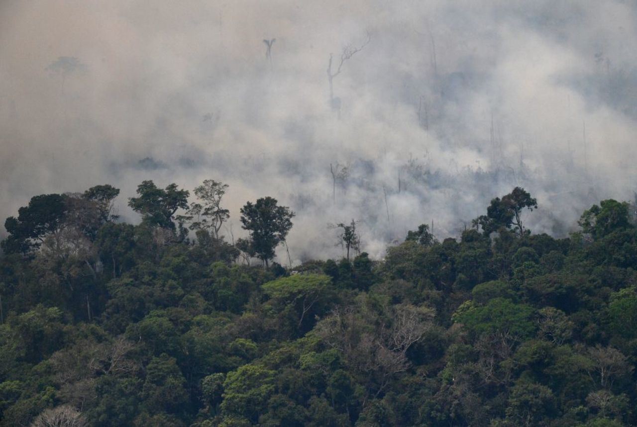 Aerial picture showing smoke from a two-kilometre-long stretch of fire billowing from the Amazon rainforest about 65 km from Porto Velho, in the state of Rondonia, in northern Brazil, on August 23.