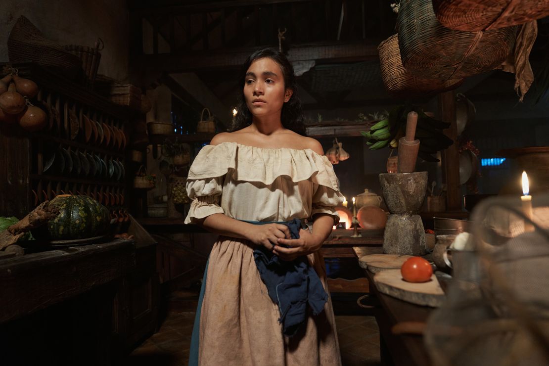 Susana Morales as Úrsula Iguarán, the matriarch of the Buendía family. The Buendía house shifts with Úrsula, reflecting her emotional state and stages in life.