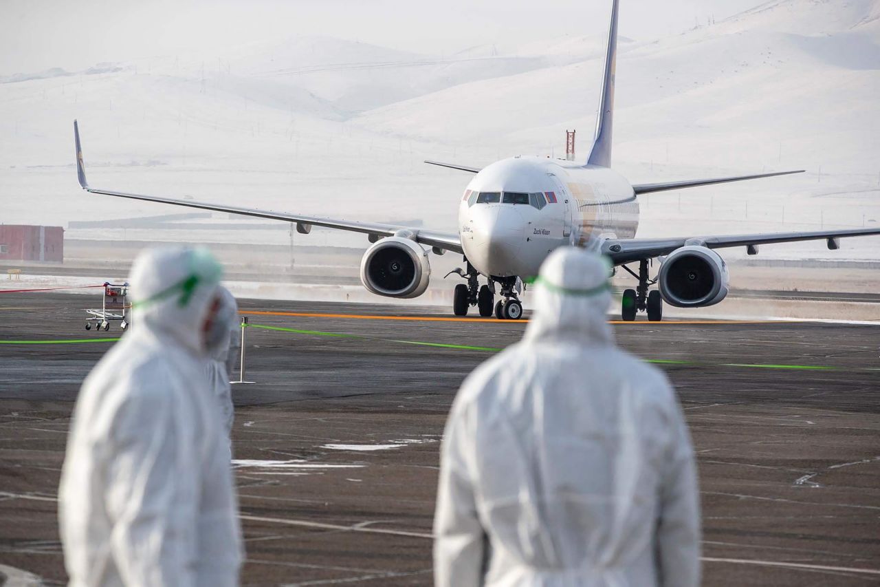 An evacuation plane carrying Mongolian citizens out of Wuhan. Numerous countries, including the US and UK, have also chartered evacuation flights.