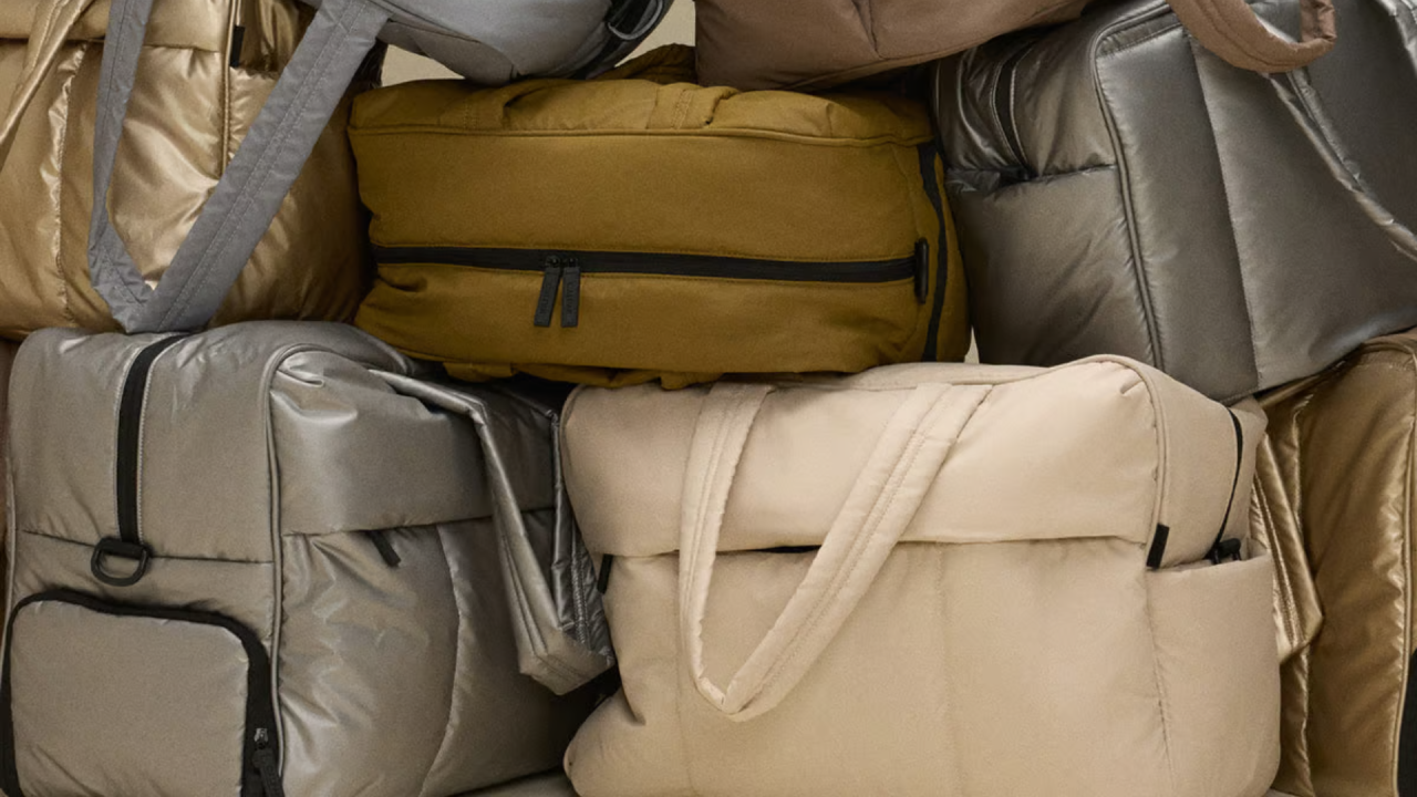Calpak Luka Duffel Bags stacked atop each other. 