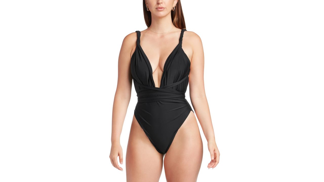 Woman wearing CAMI AND JAX Genevieve one-piece swimsuit in black