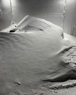 Snow completely engulfs a guest's car at the ski resort Sierra-at-Tahoe on Friday, March 1, 2024.