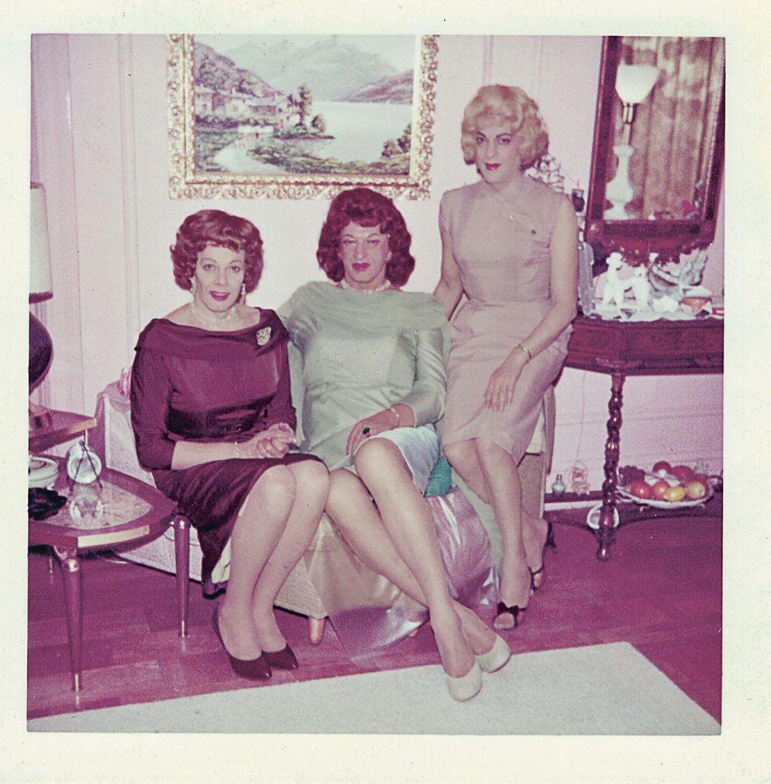 Most of the images are posed, and some are highly stylized, emulating the professional fashion and celebrity portraiture photoshoots of the era — in a way that was slightly paradoxical, said Sophie Hackett, given the growth of the women’s liberation and second wave feminist movements in broader society at the time. Pictured above, guests with Susanna Valenti (right) in her wife Marie Tonell's New York City apartment, circa 1960-63.