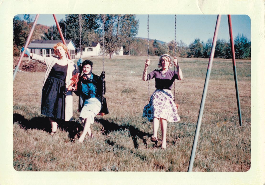 Susanna (right) and two friends are pictured on a swing set at Casa Susanna, circa 1960.