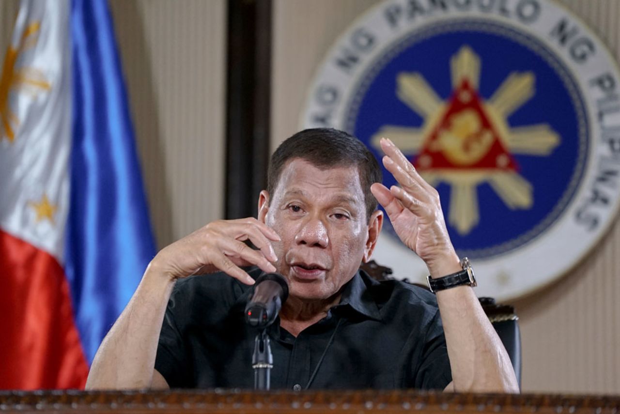 In this photo provided by the Malacanang Presidential Photographers Division, Philippine President Rodrigo Duterte gestures as he addresses the nation during a live broadcast in Malacanang, Manila, Philippines on March 30. 