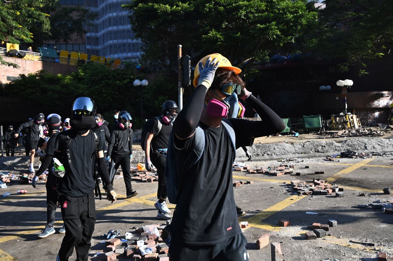 Protesters try to find safe passage out of Hong Kong Polytechnic University in Hung Hom district of Hong Kong on November 18.