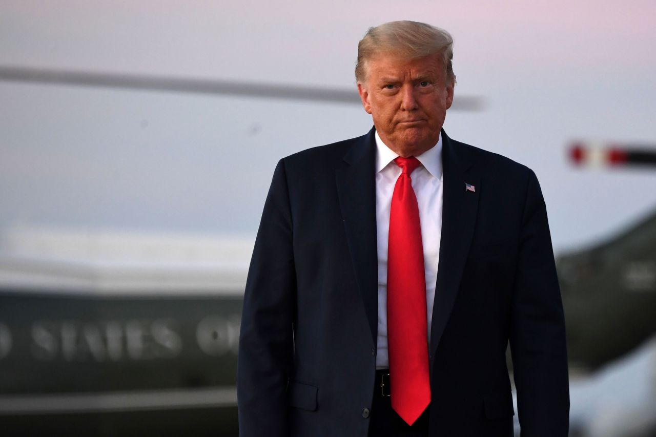 President Donald Trump walks to board Air Force One at Joint Base Andrews in Maryland on October 20.