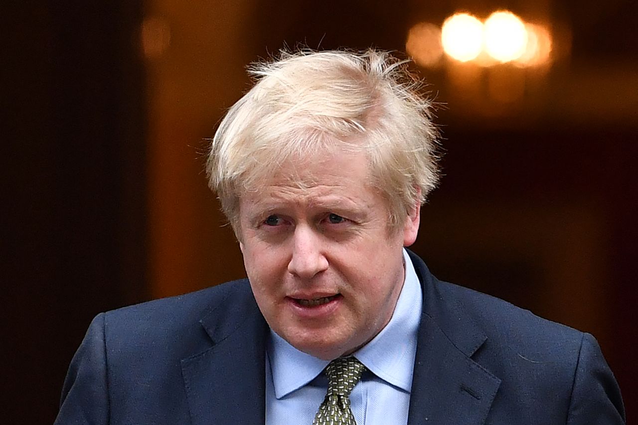 Boris Johnson pictured as he leaves Downing Street