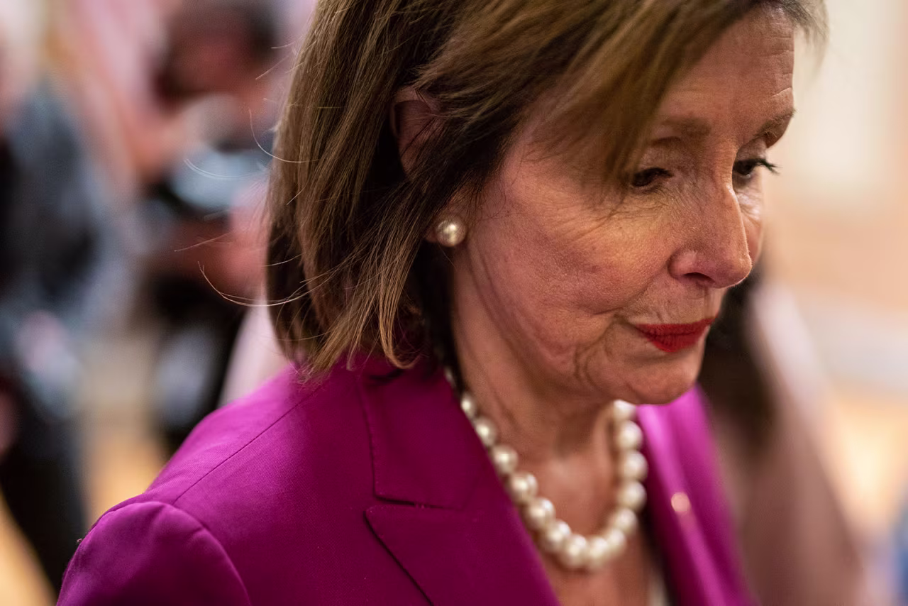 Nancy Pelosi departs from a ceremonial swearing in photo on Capitol Hill on November 14. 