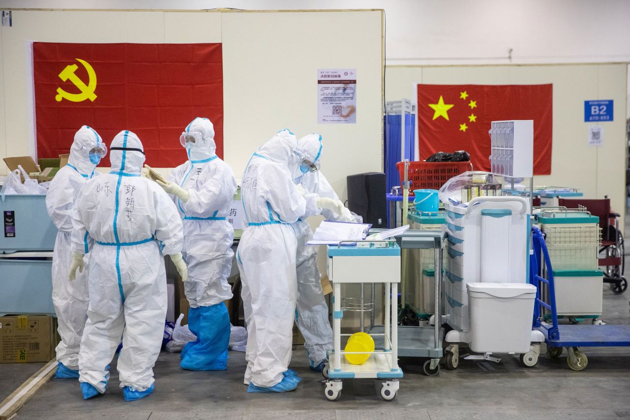 Medical staff work at an exhibition center converted into a hospital in Wuhan on February 17.