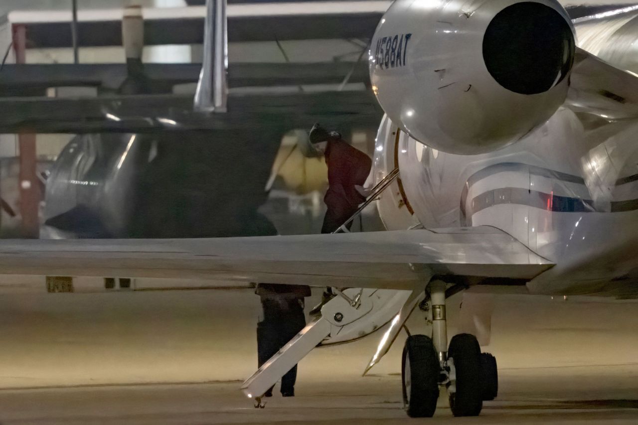 American basketball star Brittney Griner disembarks after landing in San Antonio, Texas, on December 9, 2022, after she was released from a Russian prison in exchange.