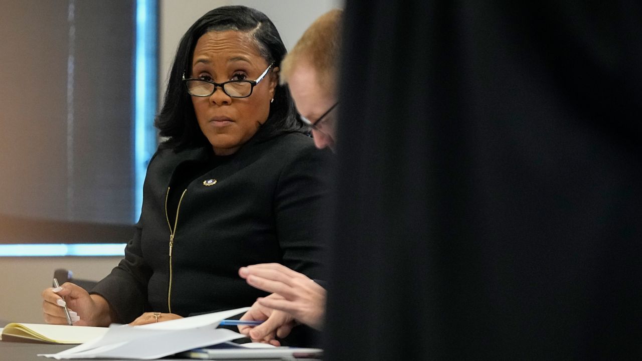 Fulton County District Attorney Fani Willis sits in a courtroom in the Fulton county courthouse, Tuesday, July 11, 2023, in Atlanta. 