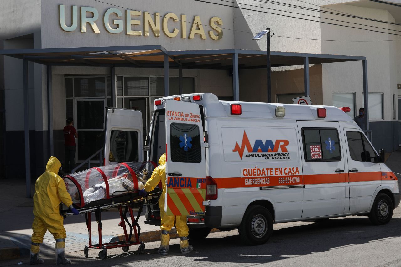 Paramedics transport a patient at the General Hospital in Ciudad Juarez, Mexico, on May 13.